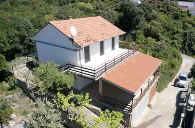 an overhead view of a house with a roof at Cozy Place in Utjeha