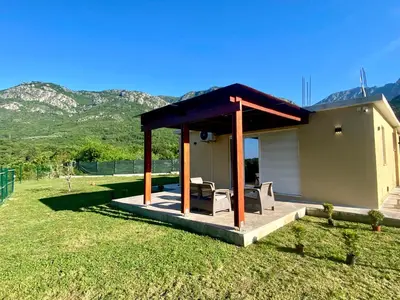 a small house with a gazebo in a yard at Oak valley in Bar
