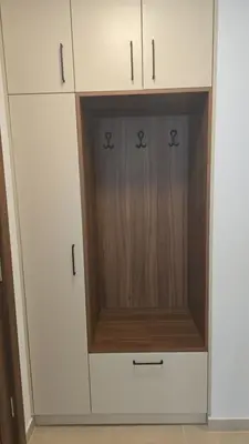 a white cabinet with a wooden door at Apartman Cetinje in Cetinje