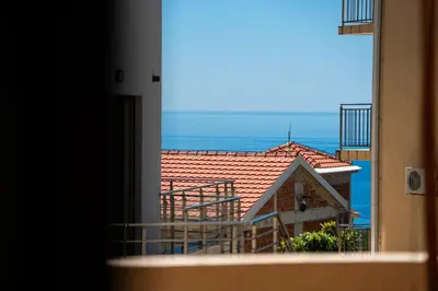 a view from a window of a house with a roof at Hillside Apartments in Becici