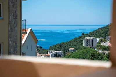a view of the ocean from a building at Hillside Apartments in Becici