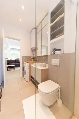 a bathroom with a toilet and a sink at Horizont studio in Becici