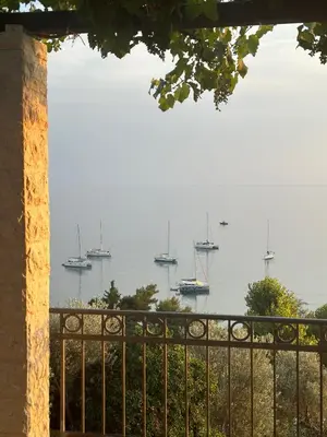 a view of a harbor with boats in the water at Suite Apartment Sveti Stefan in Sveti Stefan