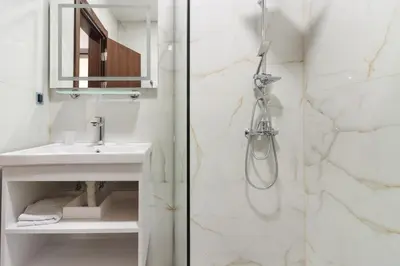 a bathroom with a shower and a sink at M&N Holiday Resort in Ulcinj