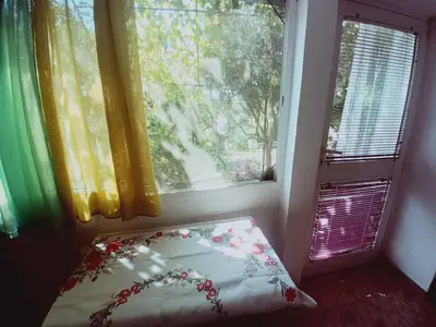 a bed in a room with a window at Zagradge IN Apartments in Zagrađe