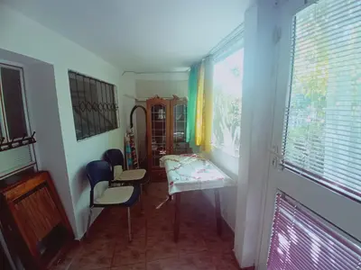 a room with a table and two chairs in a room at Zagradge IN Apartments in Zagrađe