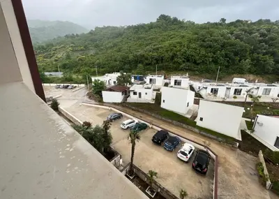 an aerial view of a parking lot with cars at Dale apartment Becici- Paradiso in Budva