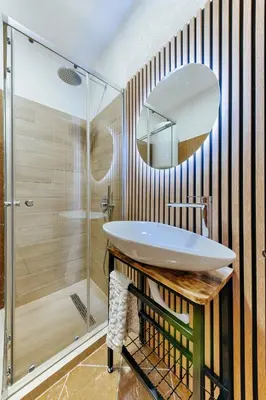 a bathroom with a sink and a shower at Olive Branch 1bd Apartment Dobra Voda in Bar