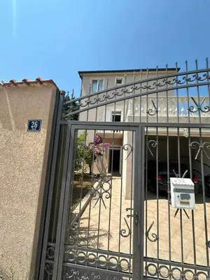 an entrance to a building with a gate at Villa Noble in Dobra Voda