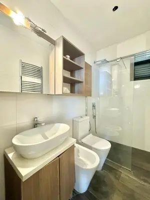 a bathroom with a white sink and a toilet at Lenny One bedroom Apartment Sveti Stefan in Budva