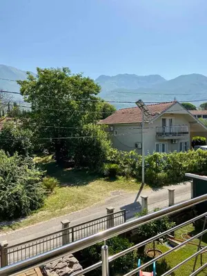a house with a street light in front of it at Apartment Victor in Kotor