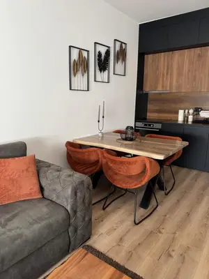a living room with a couch and a table at Apollo 2 in Ulcinj