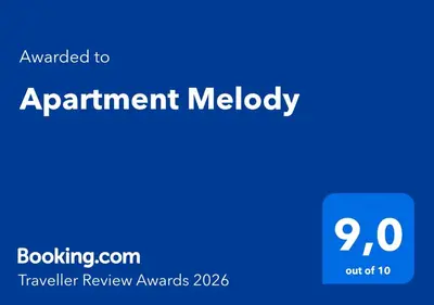 a blue sign with the words appointment melody on it at Apartment Melody in Kotor