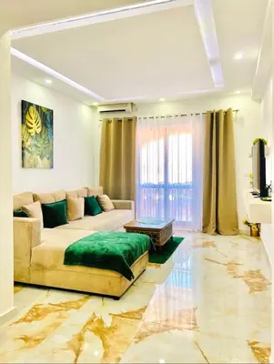 a living room with a couch and a table at Karadag in Ulcinj