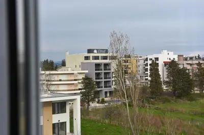 a view from a window of a city with buildings at Petra Apartment in Ulcinj