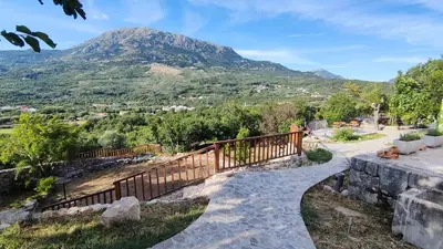 a stairway with a mountain in the background at Montenegro Tower in Pečurice