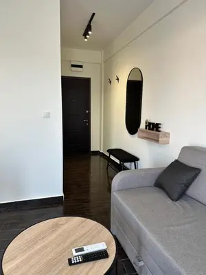 a living room with a couch and a table at Apartment Angela in Donji Štoj