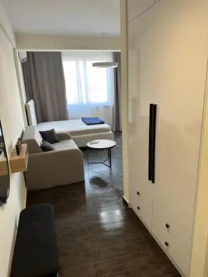 a living room with a couch and a table at Apartment Angela in Donji Štoj