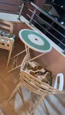 a table and a chair with a plate on it at Apartment Kata in Cetinje