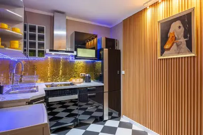 a kitchen with a black and white checkered floor at VILLA-BAROCCO Sveti-Stefan & Private Garden in Sveti Stefan