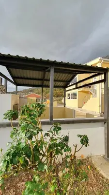 a pavilion on the side of a building at Liona in Sutomore