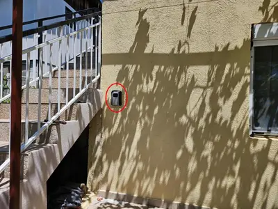 a shadow of a fence on the side of a building at Montebar2 in Brca