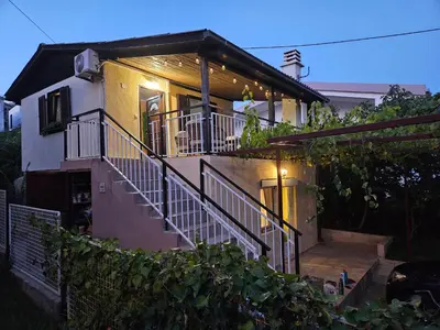 a house with a staircase in front of it at Montebar1 in Bar