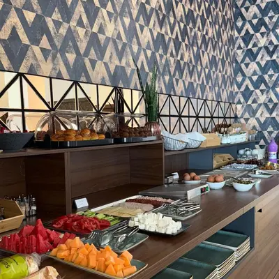 a buffet line with many different types of food at Hotel Sutomore in Sutomore