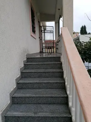 a set of stairs leading up to a building at Villa Delfin 1-2-3-4 in Bar