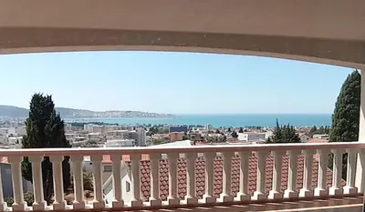 a balcony with a view of the city at Villa Delfin 1-2-3-4 in Bar