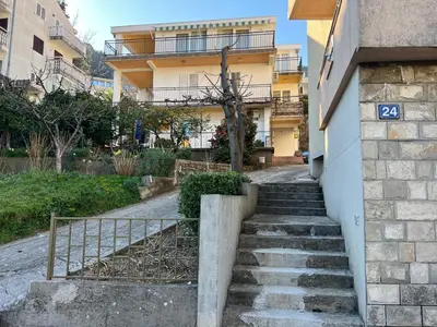 a set of stairs in front of a building at Guest House Plima 2 in Budva