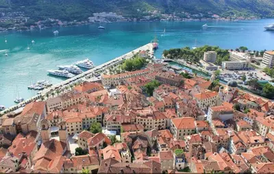 an aerial view of a town with boats in the water at Apartment Sofija in Kotor