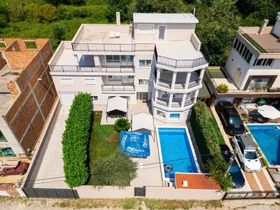 an aerial view of a house with a swimming pool at Luxury Villa Boričić in Kotor