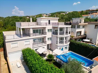 an aerial view of a building with a swimming pool at Luxury Villa Boričić in Kotor