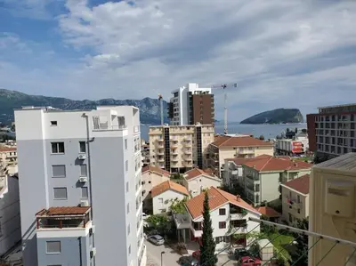 a view of a city with buildings and the ocean at P&N Bu2 in Budva