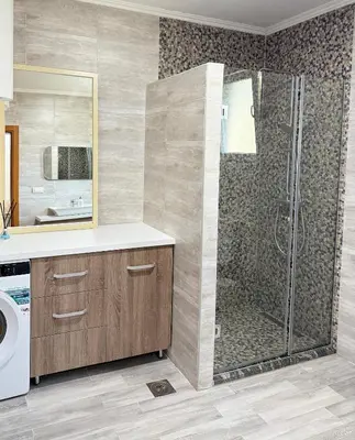 a bathroom with a shower and a sink at BonacaL&I in Bar