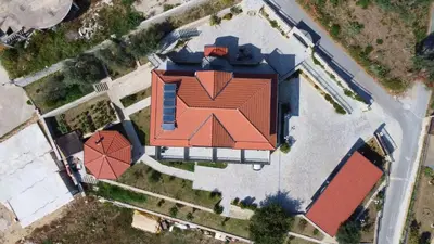 an overhead view of a house with an orange roof at Apartments Villa Bari in Ulcinj