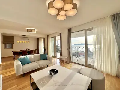 a living room with a couch and a table at Luxury Apartments Przno in Budva