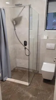 a shower with a glass door in a bathroom at Villa Moonlight in Budva