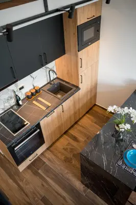 a kitchen with a sink and a counter at Appartement en Chêne in Kotor