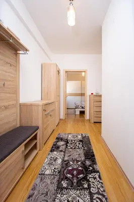 a large room with a rug on the floor at Sea view Lazi in Budva