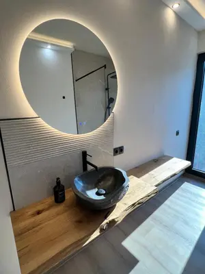a bathroom with a bowl sink and a mirror at Villa Infinity Bar Montenegro in Brca