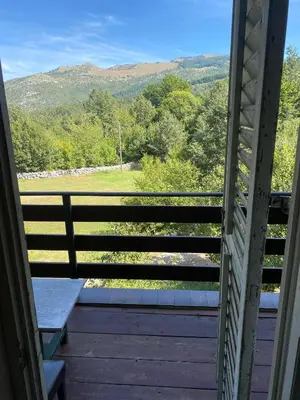 a view from the window of a porch with a view at Izletiste Pocivala in Podgorica
