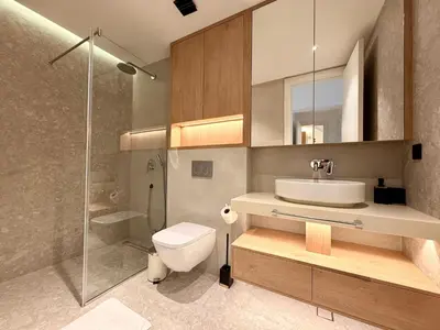 a bathroom with a toilet and a sink and a shower at Two bedroom apartment Onia - Budva in Budva