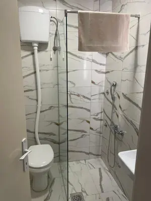 a bathroom with a toilet and a sink and a shower at Konoba Ceklin in Cetinje