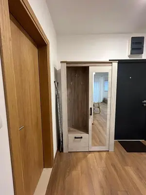 a small room with a door and a hallway at Appartement entièrement équipé neuf Budva - Appart 8 in Budva