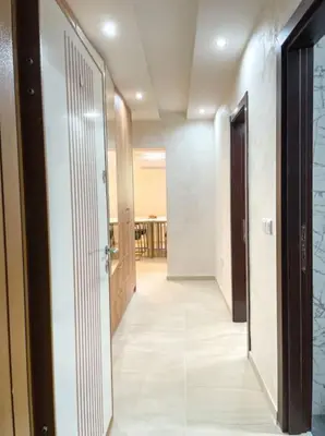 a hallway with an open door and a hallwayngthngthngthngthngthngthngth at Tihanas apartment in Kotor