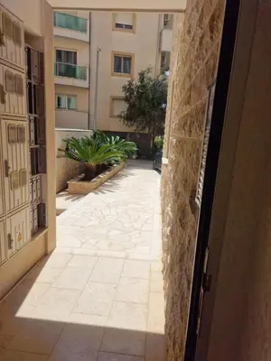 an open door to a walkway in a building at Studio Apartment Ljilja in Budva