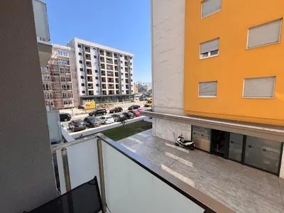 an apartment balcony with a view of a city at Spring Apartment in Podgorica