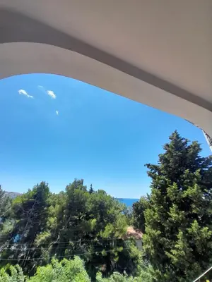 a view of the sky through a window at Šušanj dvokrevetna soba in Bar, Susanj